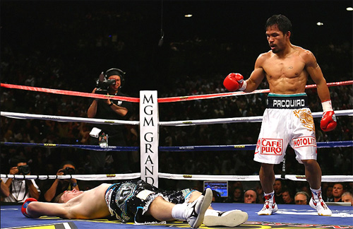 Pacquiao có tỷ lệ thắng bằng kknock-out tốt hơn hẳn so với Mayweather. Ảnh: AFP.